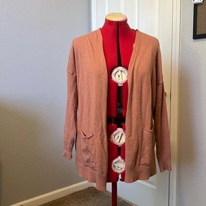 Ninexis sz M orange cardigan pockets. Never worn New